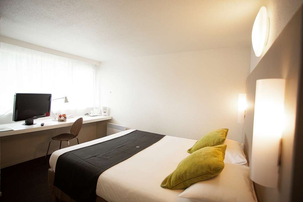 โรงแรม แคมพาไนล์ อะแวลลอน Sauvigny-le-Bois ห้อง รูปภาพ